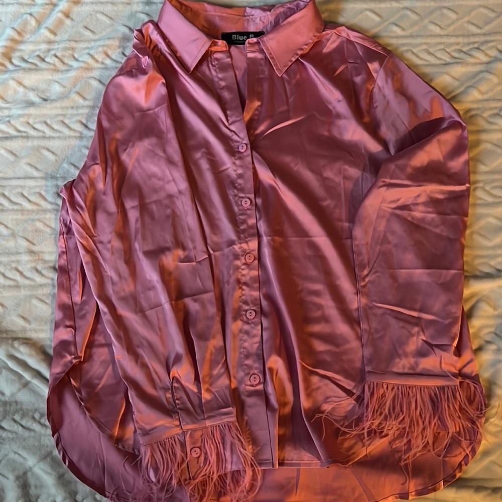 Hot pink button down top with feather cuffs. Blue B brand size L
